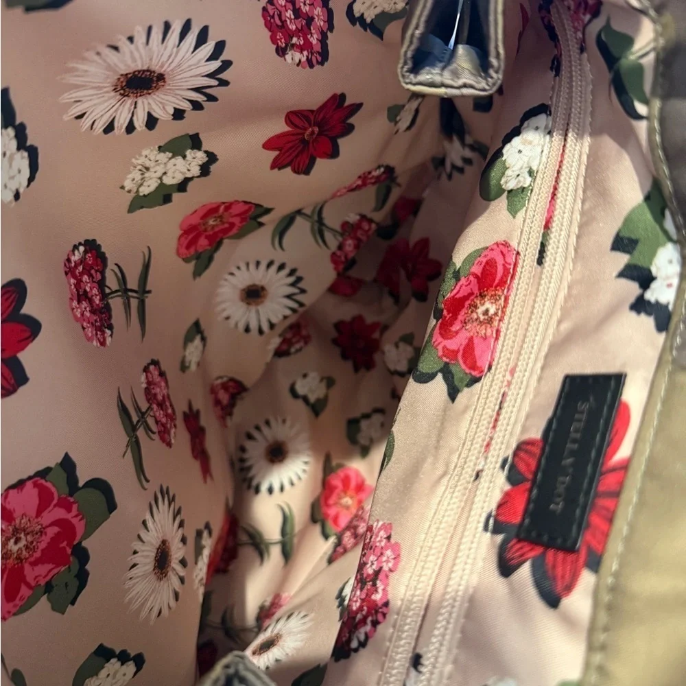 Stella & Dot Camouflage Print and Floral Interior Bag with Red and Green Accents